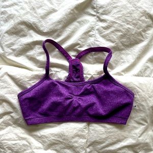 small purple sports bra by Ivivva.